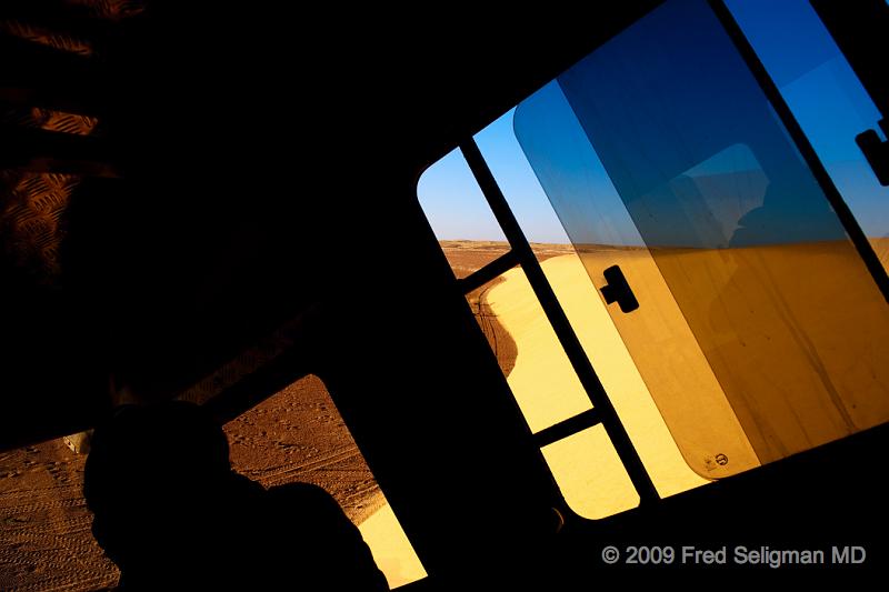 20090603_164810 D3 X1.jpg - Descending a sand dune, Skeleton Coast Camp, Namibia